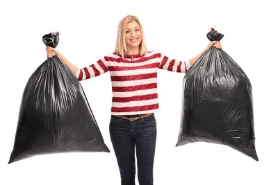 Woman holding garbages